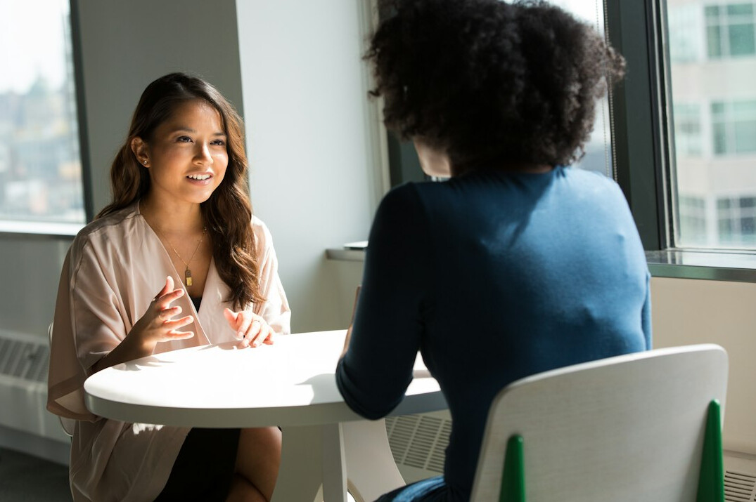 colleagues discussing in meeting