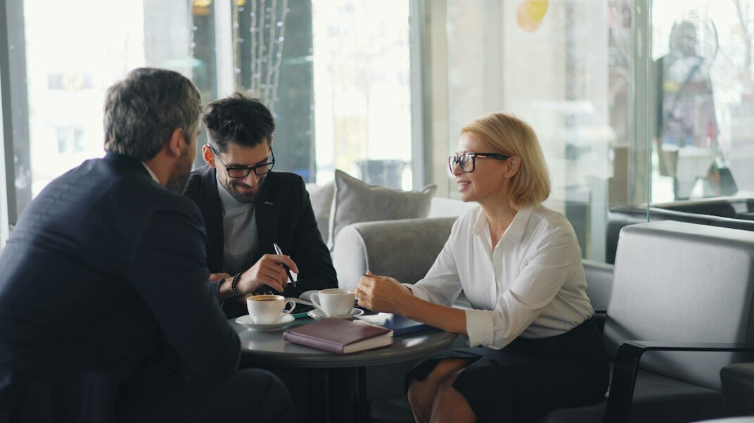 person speaking confidently in meeting
