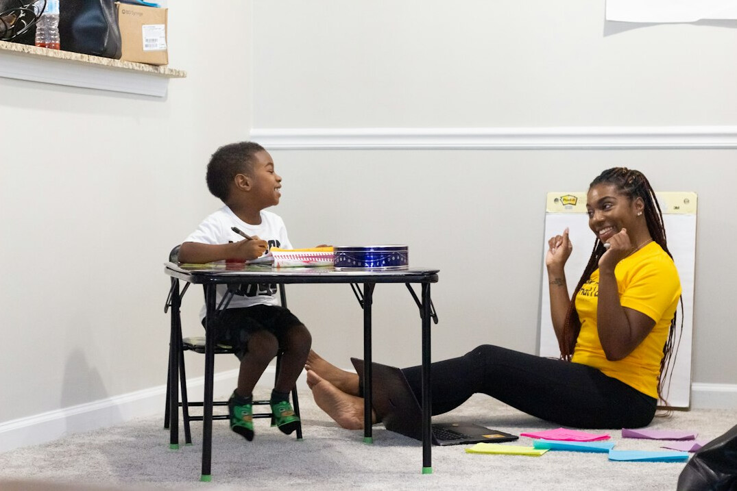 mentor guiding student in conversation